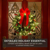 Christmas wreath hanging on front door display