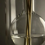 Close-up of Crystal Glass Reed Diffuser Bottle with Wooden Fragrance Sticks