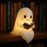 Ghost night light LED lamp glowing soft white on dark background for kids room