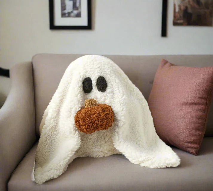 Ghost pillow Halloween cute ghost shaped close up detail pumpkin face