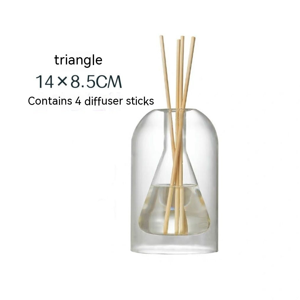 Clear glass diffuser bottle with wooden sticks labeled 'triangle 14 x 8.5CM Contains 4 diffuser sticks' on a white background.