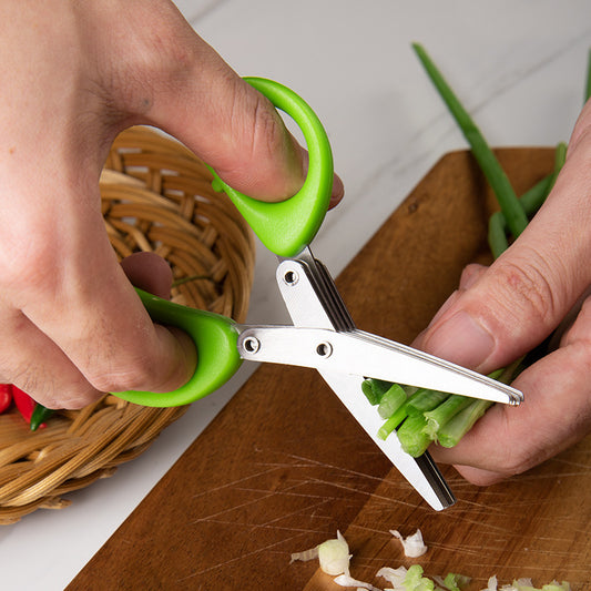 Multi layer herb cutting scissors cutting green onion on board