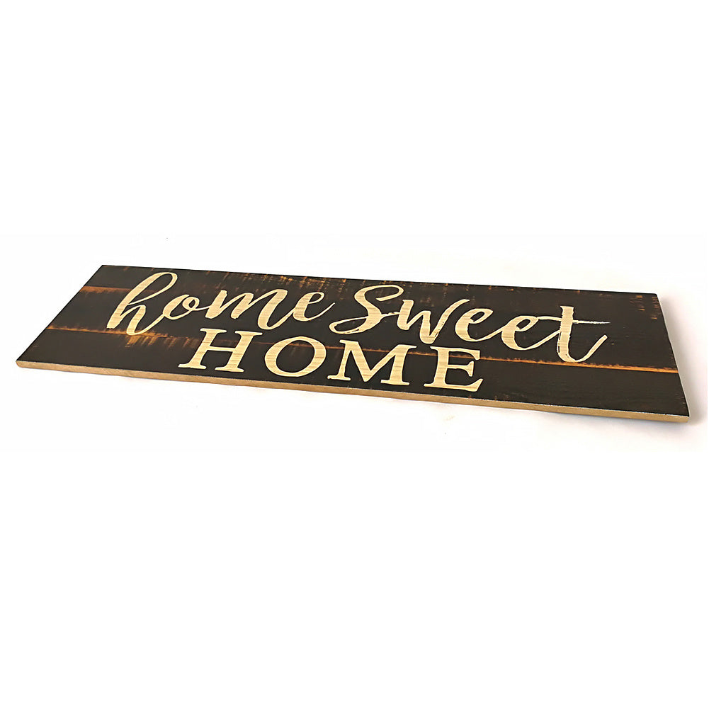 Home sweet home hanging wooden wall ornament carved close up detail