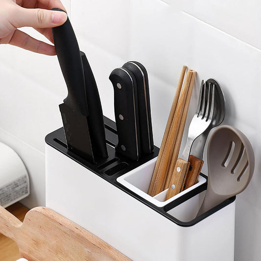 Knife storage rack holding knives and kitchen utensils