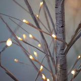 LED birch tree lights shown in natural daylight