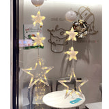 Close up of LED star and moon hanging lights