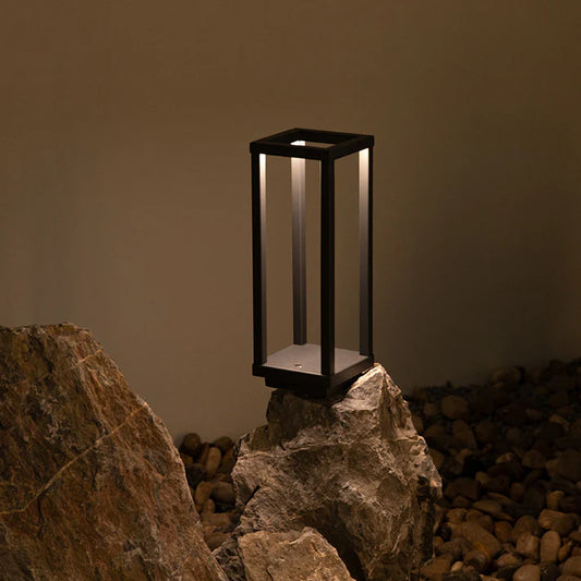 Luxury rechargeable table lamp glowing warm light in dark room