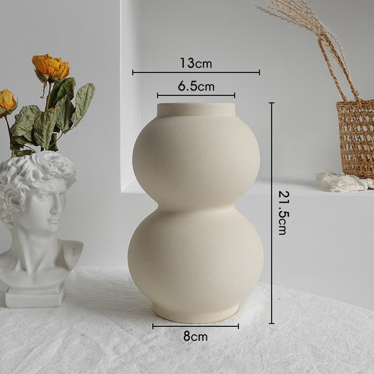 Close-up of the smooth unglazed matte surface texture of the Nordic ceramic vase