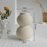 Close-up of the smooth unglazed matte surface texture of the Nordic ceramic vase