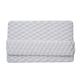 Foot pressing into the memory foam bathroom mat showing compression and cushion underfoot