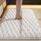 All three color options of the memory foam bathroom mat laid flat side by side