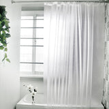 Waterproof mildew resistant PEVA shower curtain hanging on a bathroom rod over a bathtub