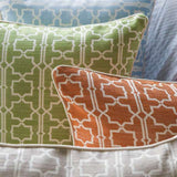 Sky blue Moroccan trellis throw pillow on bed