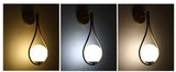 Nordic bedroom LED wall lamp milk white glass shade bulb close up detail