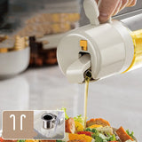Olive oil sprayer bottle drizzling oil on fresh salad