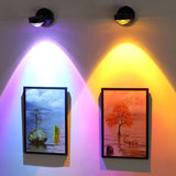 Rechargeable sunset red wall lamp glowing on a bedroom wall with warm orange tones
