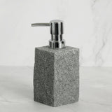 Grey resin soap dispenser from 4 piece bathroom set