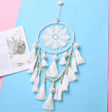 Close-up of the wooden beads and iron ring detail on the romantic decorative wall dream catcher