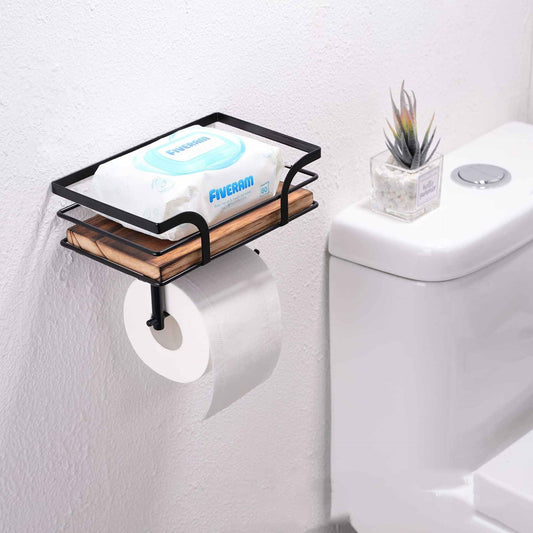 Farmhouse wood and iron toilet paper holder on a bathroom counter beside a sink