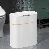 Cream white smart touchless trash can in bathroom