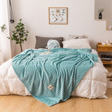 Close-up of the dense smooth plush pile texture of the queen size polyester fleece blanket