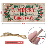 Close up detail of Splendas carved beech wood Christmas wall hanging sign festive text
