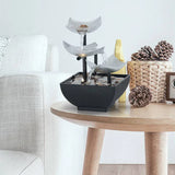 Splendas indoor flowing water fountain ornament with pebbles in black base display