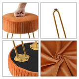 Compact striped metal stool used in a home entryway as a seat for putting on shoes