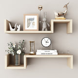 60cm wide wall mounted shelf in wood color holding books and decorative items