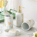 4 piece white marble bathroom accessories set with gold touch