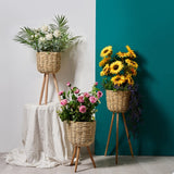 Small natural straw floor pot beside a bedroom window with a small potted plant inside