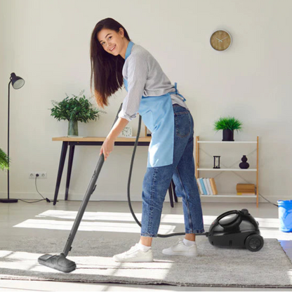 Woman using 1500W steam floor cleaner on living room carpet