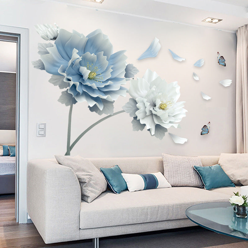 Large 3D blue flower wall sticker on living room wall above sofa