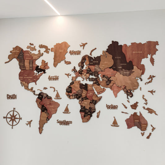 Large 3D wooden world map wall art mounted on a living room feature wall above a sofa

