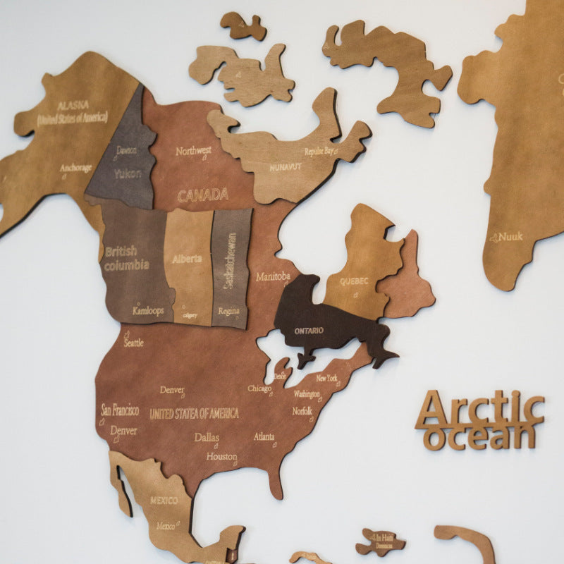 3D wooden world map wall decoration mounted on a home office study wall as a feature piece
