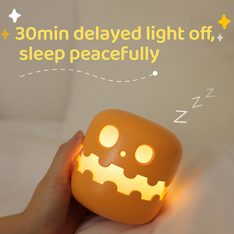 Splendas pumpkin lamp Halloween bedside night light styled in cozy room lifestyle setting