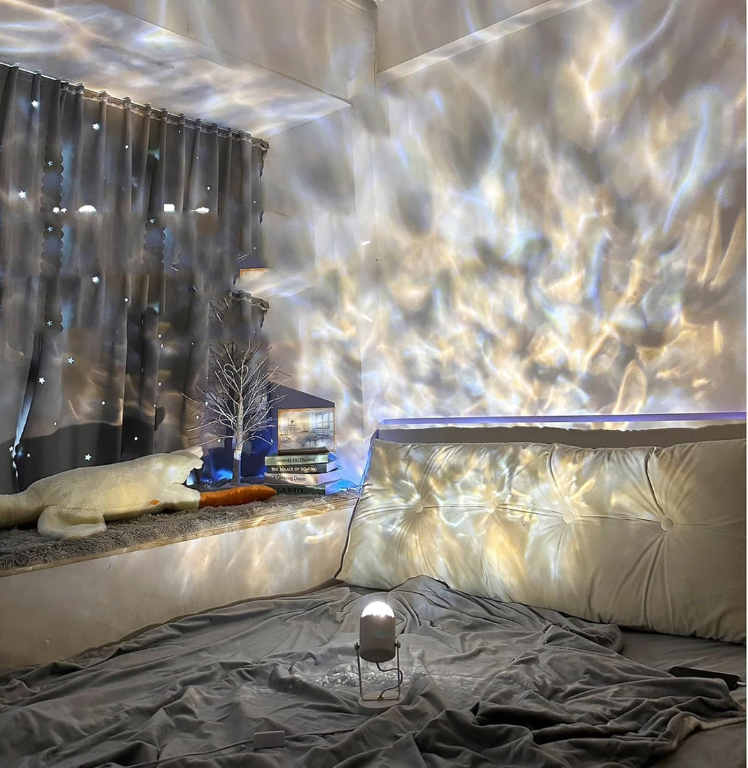 Room with artistic light projection on the ceiling and walls, featuring a bed and decorative items.