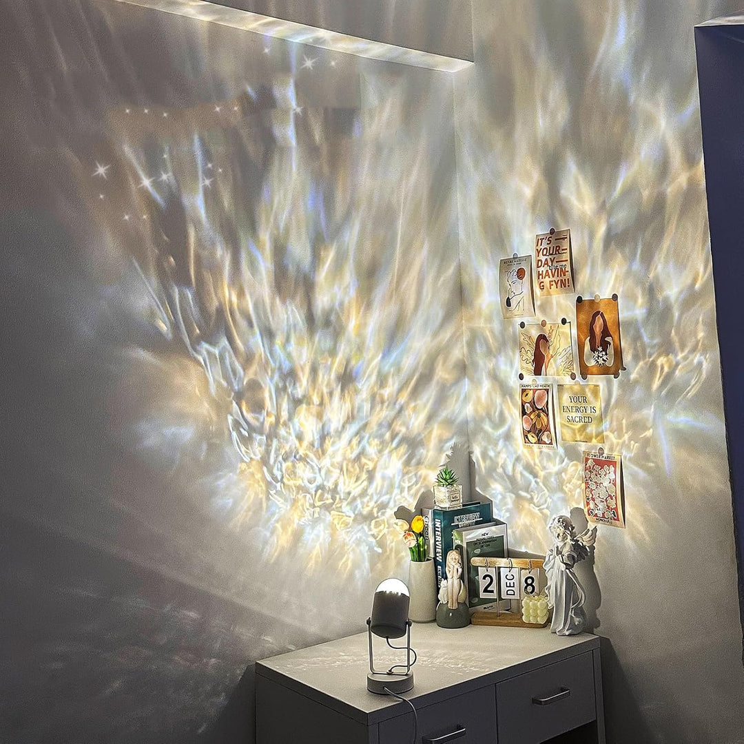 Decorative wall with abstract design, small table with decorative items, and framed pictures.