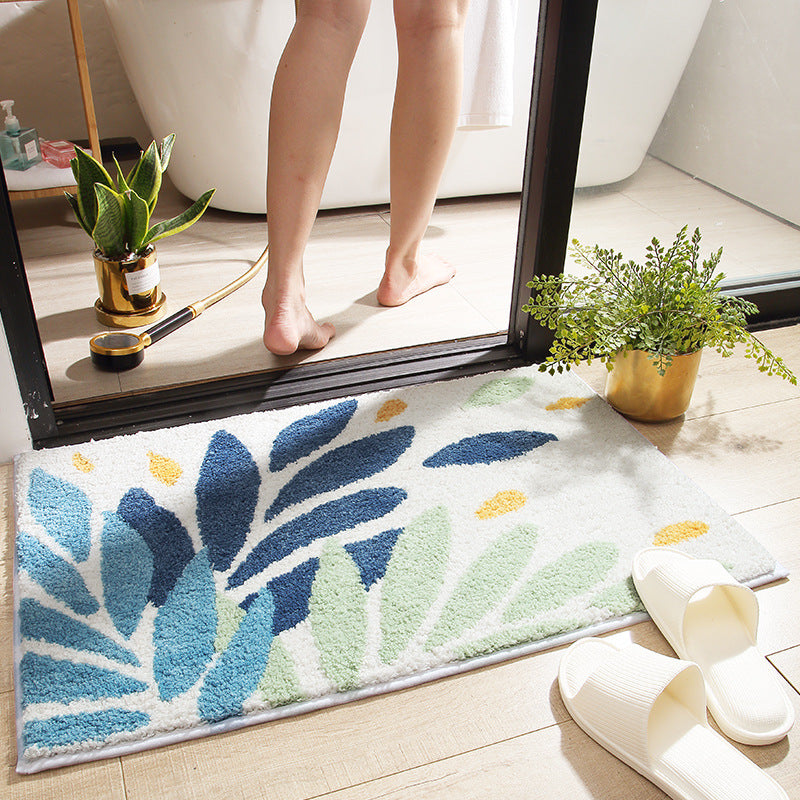 Close-up of the geometric abstract pattern woven into the surface of the absorbent bath mat

