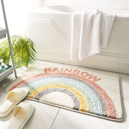 Quick dry absorbent bath mat positioned at the exit of a shower stall on tile floor
