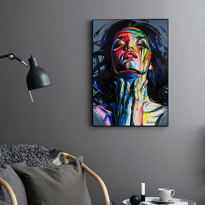 Abstract wall art woman face oil painting hung in modern living room