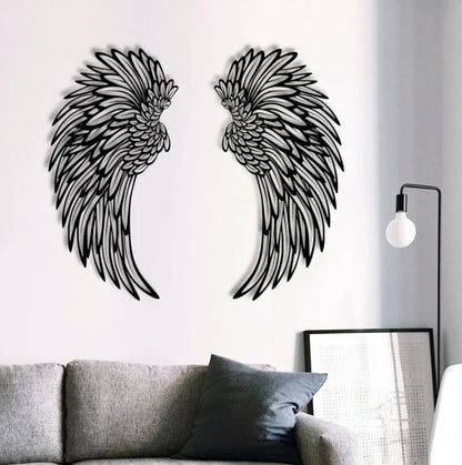Iron angel wings wall art mounted on bedroom wall
