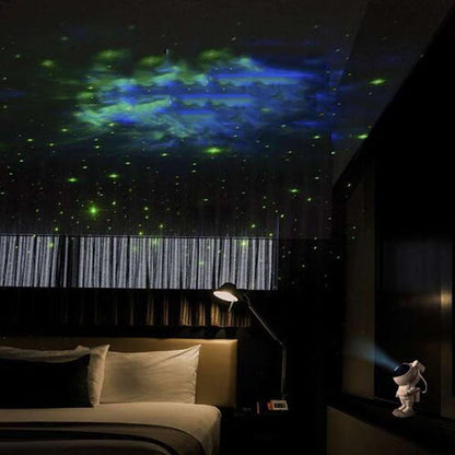 Astronaut galaxy projector lamp showing purple starry ceiling effect