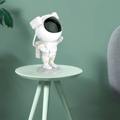 Side view of astronaut galaxy projector nightlight lamp