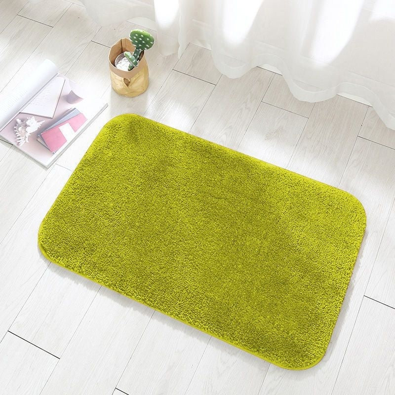 Small 40x60cm flannel absorbent mat in front of a bathroom sink for size reference

