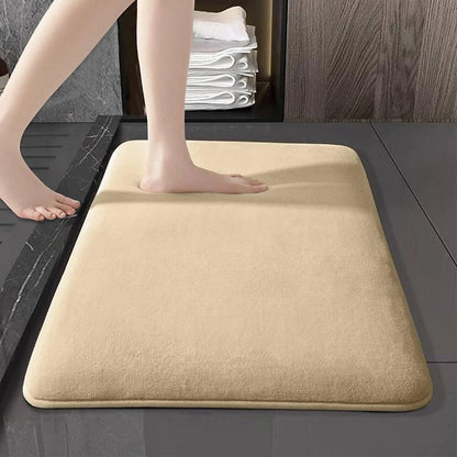 All eight solid color options of the absorbent flannel floor mat laid flat side by side
