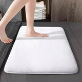 All four sizes of the absorbent flannel bathroom floor mat displayed for size comparison