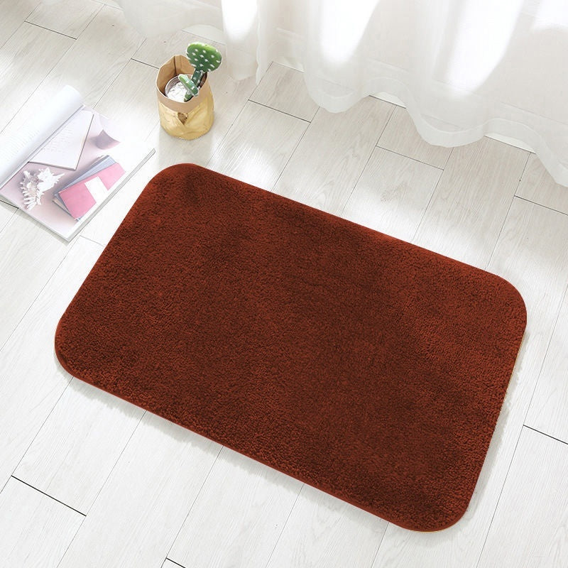 Close-up of the soft flannel surface texture on the bathroom absorbent floor mat
