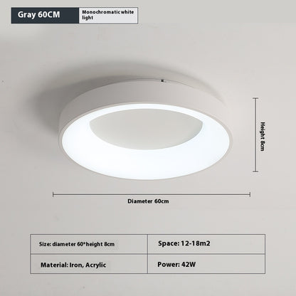 Flush mount ceiling lamp in a low ceiling bedroom showing full clearance with no pendant drop
