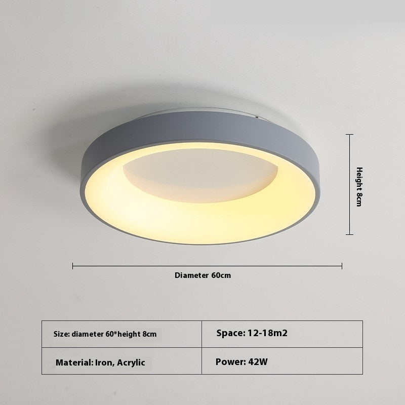Iron base of the flush mount bedroom ceiling lamp mounted flat on a ceiling electrical box
